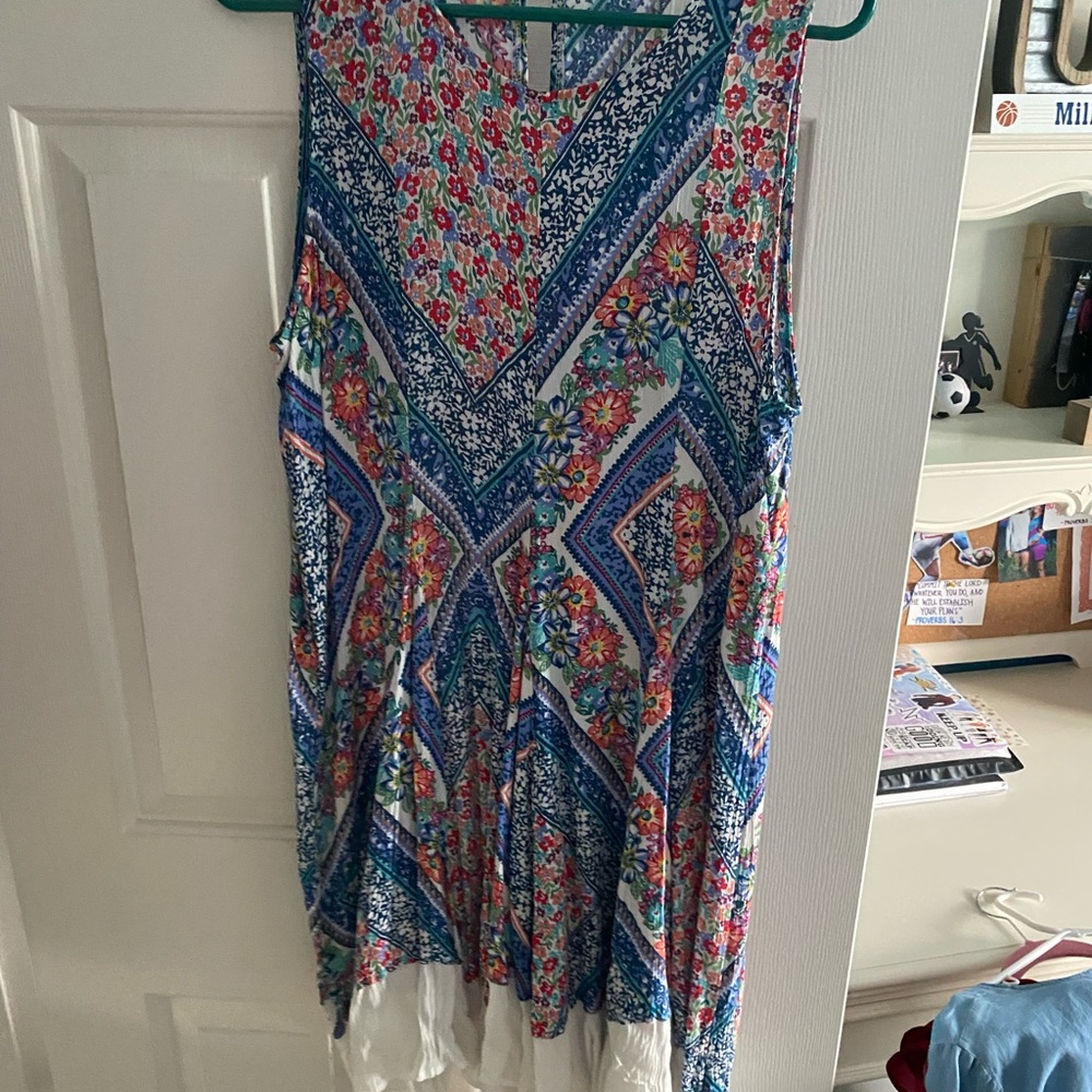 Colorful dress with white along the bottom! Very flowy!